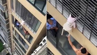 Во Кина спасено девојче кое висело од прозорец на 12-ти кат (ВИДЕО)