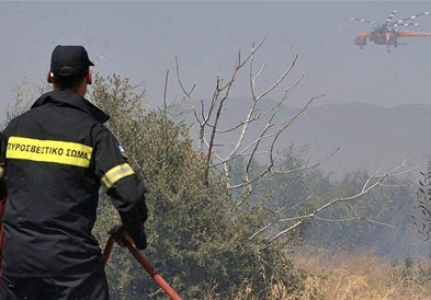 Големи пожари на грчките острови Евија и Крит