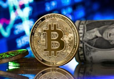 Биткоинот за прв пат надмина вредност од 50.000 долари