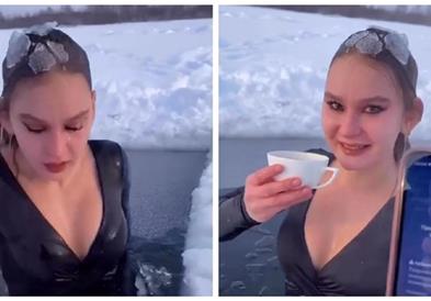 Русинка излегува од замрзната вода и пие кафе на минус 27 степени, снимката е хит (ВИДЕО)