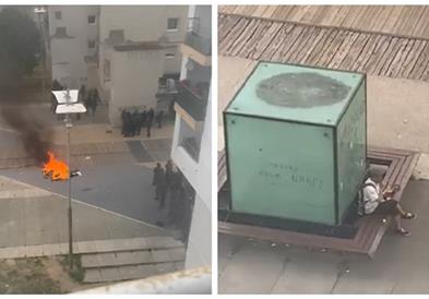 Французин мирно си јаде сендвич, додека одколу него се води востинска „војна“ (ВИДЕО)