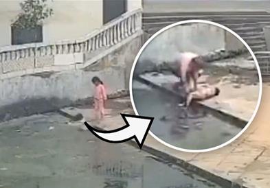 63 секунди паника: Детенце се дави во канал за отпадни води (ВИДЕО)