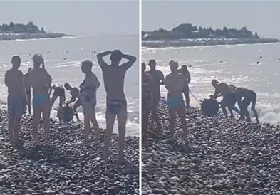 Туристи влегле во вода, па на плажата извлекле огромна против-бродска мина (ВИДЕО)