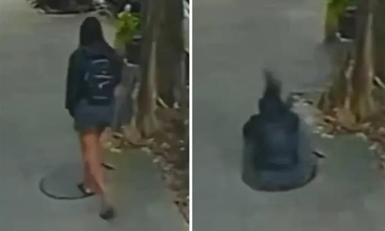 Девојка гледа во телефон, кога наеднаш пропаѓа во шахта (Вознемирувачко видео) 