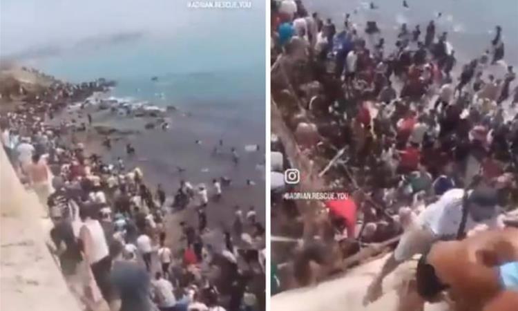 Мигранти ја преплавија шпанската граница, ги совладаа и полицајците (ВИДЕО)