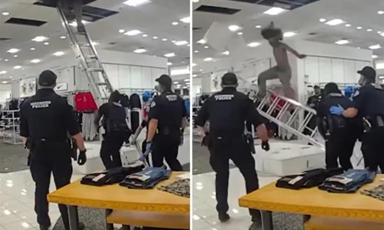 Снимка од апсење во трговски центар е хит- крадецот ползи низ таванот, полицијата го чека со душек (ВИДЕО) 