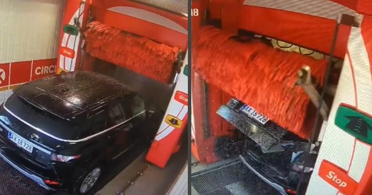 Автоматски багажник се отвори на скап џип во автоматска пералница, штетата е голома (ВИДЕО)