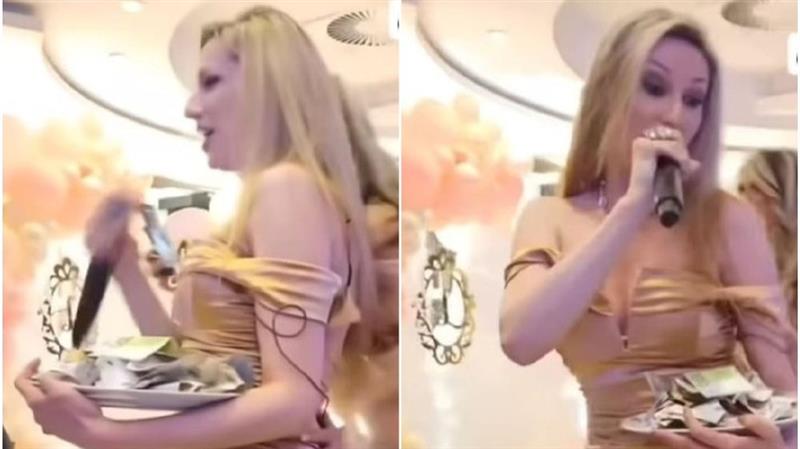 Видео-Фото: Српска пејачка има проблем да го собере бакшишот