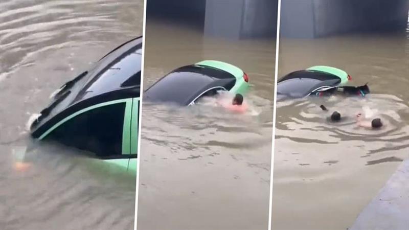 Драма во Кина: Автомобил пропаѓа во вода, маж спасува жена во последен момент (ВИДЕО)