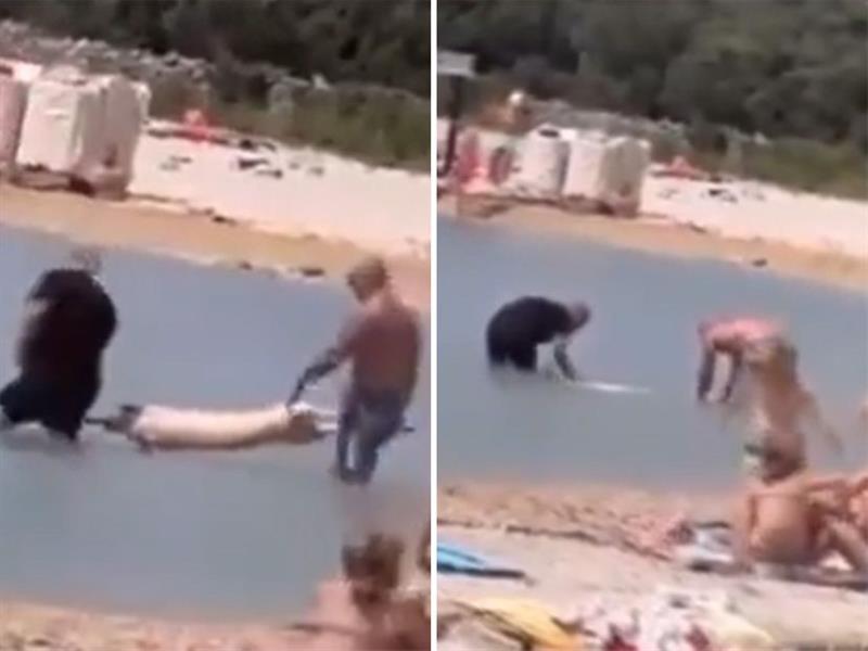 Цела плажа во шок- однеле свиња на ражен во морето за да ја посолат (ВИДЕО)